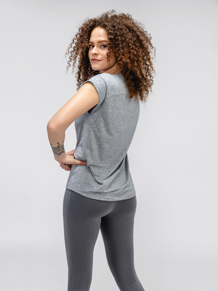 Back of Women's Pale Grey Heather Composite Merino V-Neck Tee on model