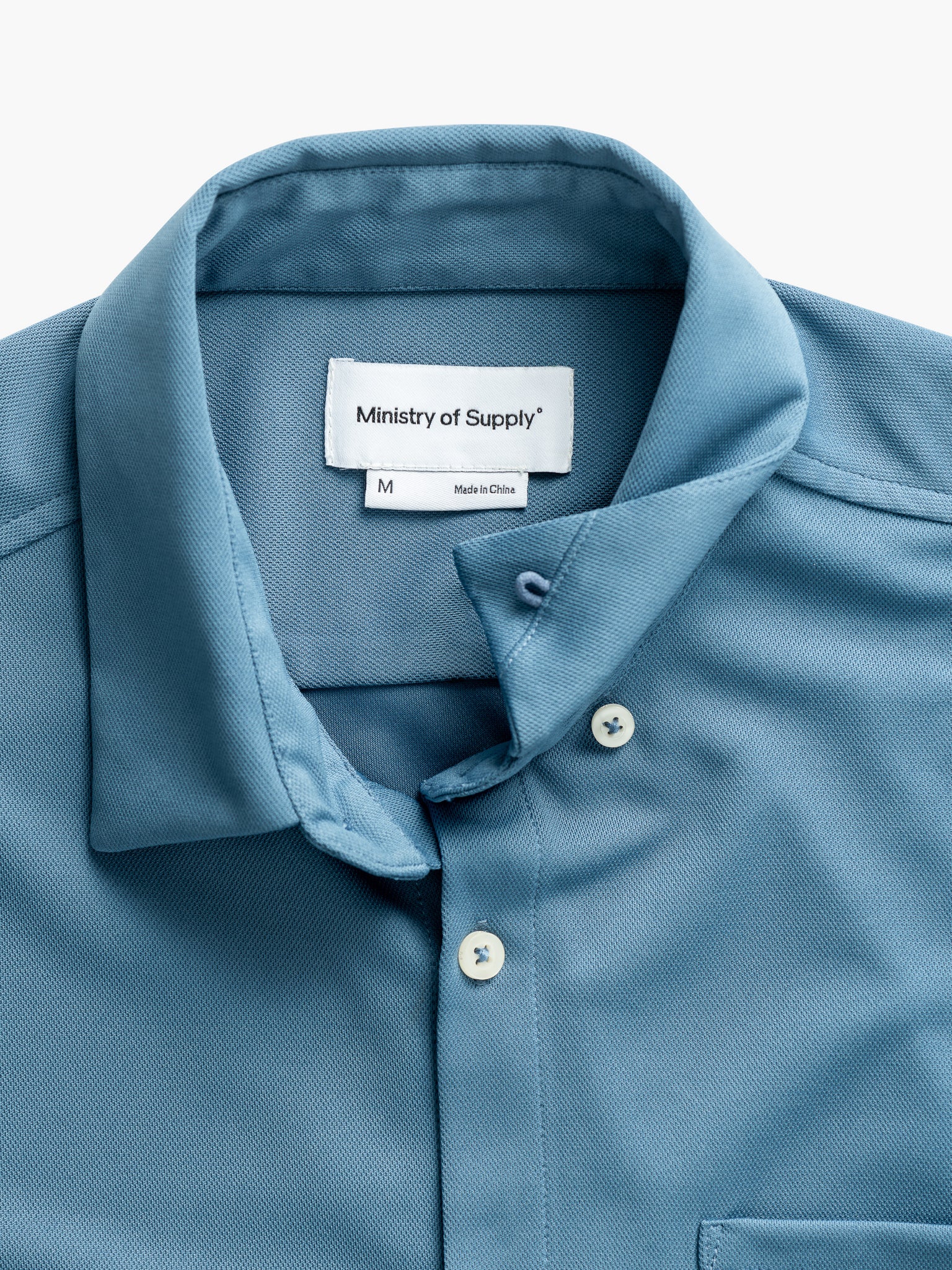 men's atlantic blue apollo short sleeve sport shirt zoomed shot of hidden collar buttons