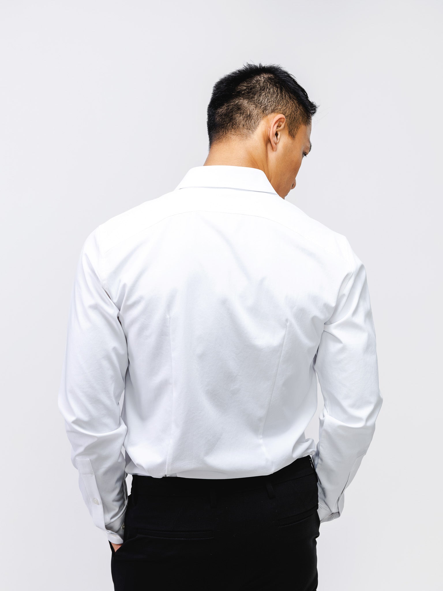 Back of White Men's Aero Zero Dress Shirt on model