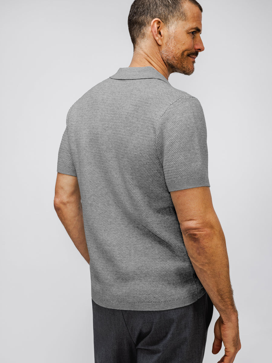 model wearing Men's Labs Atlas Short Sleeve Knit Polo mercury grey heather flat