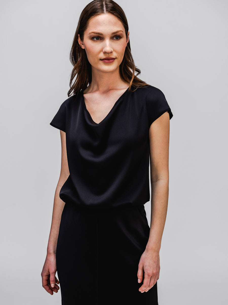 model wearing womens Swift Satin Reversible Blouse black in studio