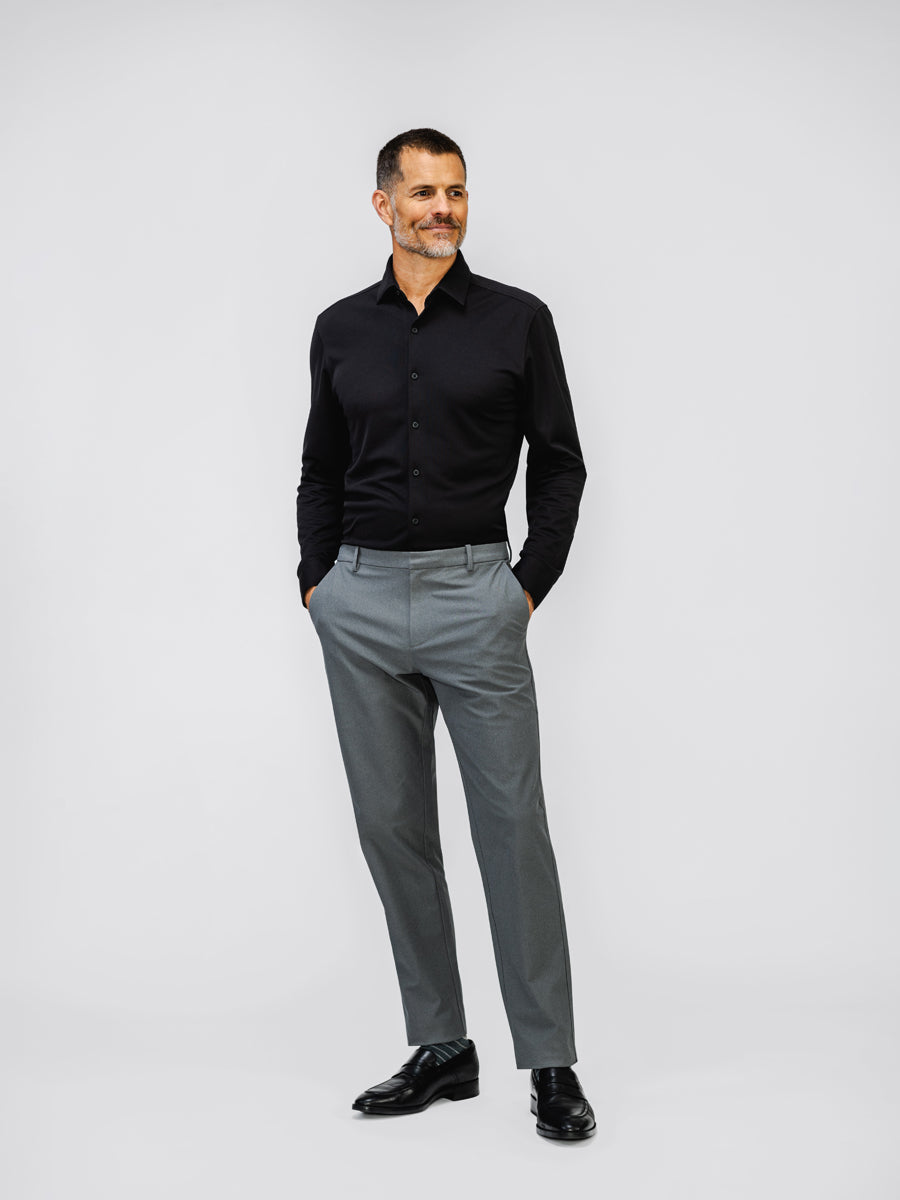 mens apollo dress shirt black mens kinetic pant slate grey on model in studio