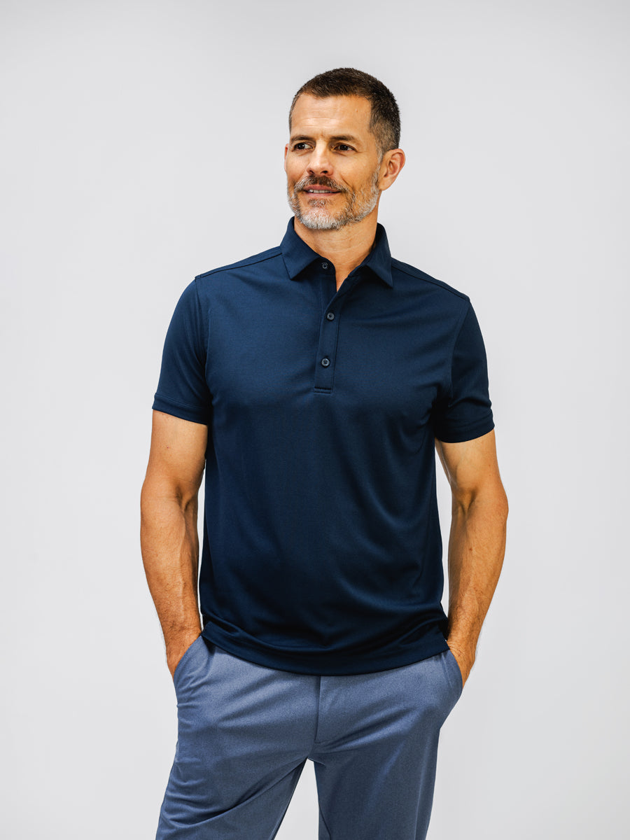 mens apollo polo navy on model in studio